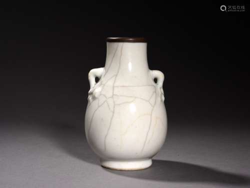 A MOULDED AFTER KUAN TYPE ZUN VASE, 18TH CENTURY