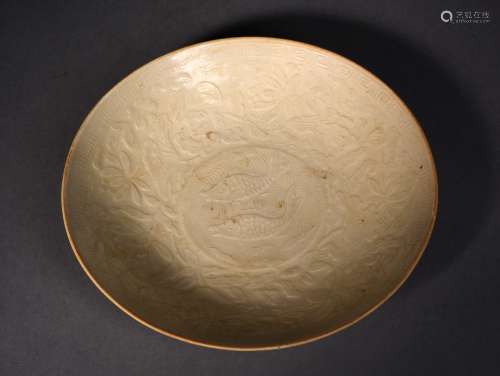 A TING MOULDED DOUBLE FISHES BOWL, SUNG DYNASTY