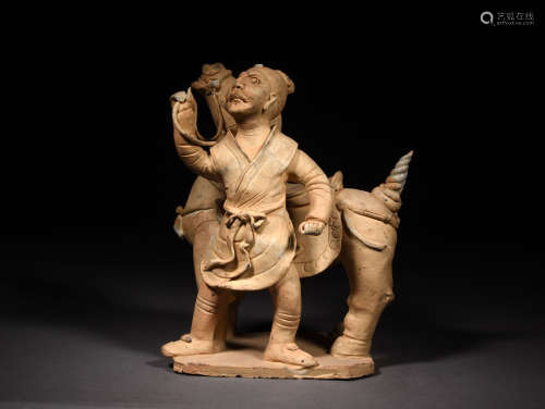 A POTTERY HORSE AND GROOM, SUNG DYNASTY