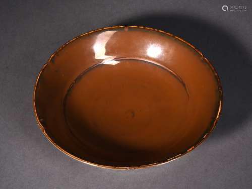 A PERSIMMON-GLAZED TING PLATE, SUNG DYNASTY
