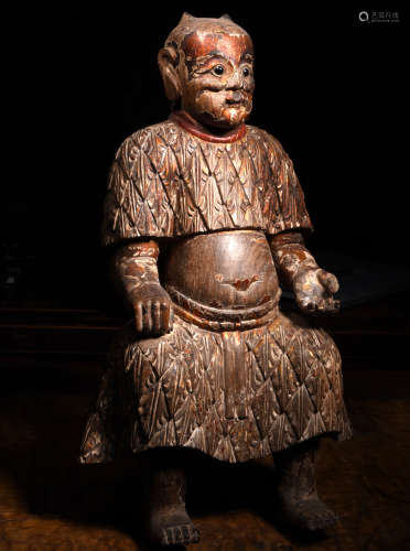 A CARVED WOOD FIGURE OF SEATED MALE, 18TH/19TH CENTURY