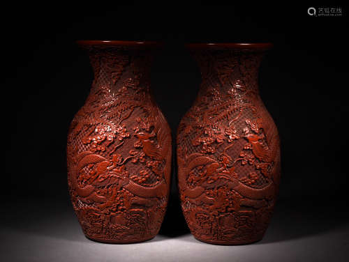 A PAIR OF CARVED CINNABAR LACQUER VASES, 18TH CENTURY