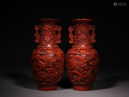 A PAIR OF CARVED CINNABAR LACQUER VASES, 19TH CENTURY