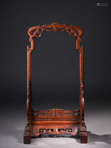 A HUANGHUALI BRUSH REST,  19TH CENTURY