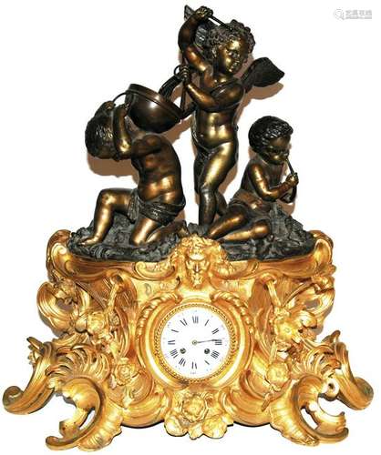 orologio da tavolo in bronzo dorato e patinato,