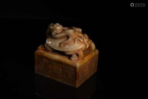 A CREAMY WHITE AND RUSSET JADE SEAL,HAN DYNASTY