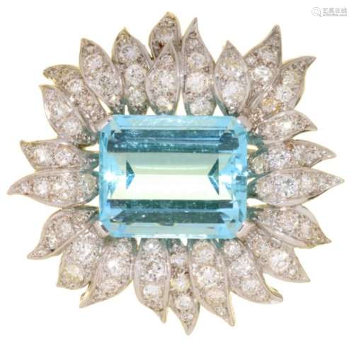 AN AQUAMARINE AND DIAMOND BROOCH the step cut aquamarine in pavé set flower shaped surround, 3.