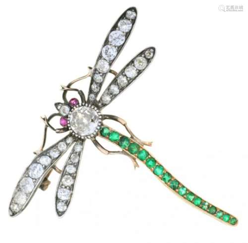 AN EDWARD VII DIAMOND AND EMERALD DRAGONFLY BROOCH, C1900 with ruby eyes, the collet SE set