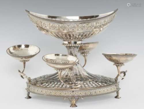 A GEORGE III NEO CLASSICAL SILVER EPERGNE of fluted oval form, pierced and chased with anthemia,
