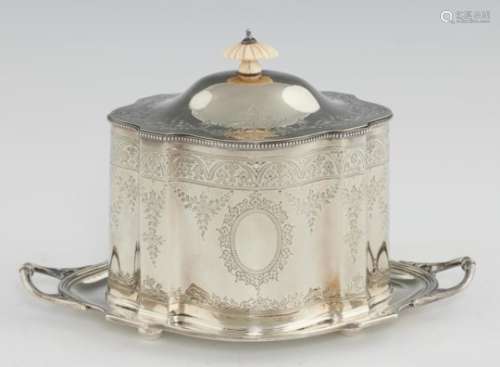 A VICTORIAN SILVER BISCUIT BOX of straight sided serpentine form with beaded rims and engraved