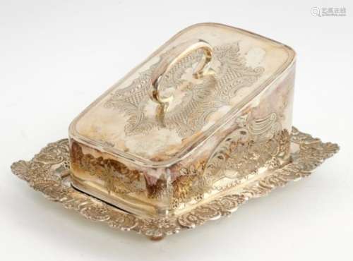 A VICTORIAN SILVER CHEESE DISH AND COVER the wedge shaped cover engraved with foliage and leafy