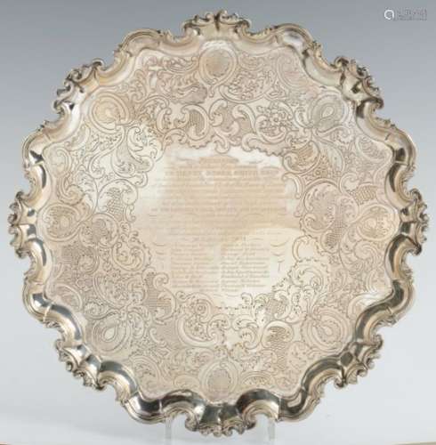 PARLIAMENTARY INTEREST. AN IRISH GEORGE II SILVER SALVER on four feet, later chased, 41.5cm diam, by