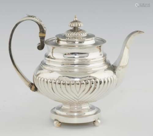A GEORGE IV SILVER TEAPOT spirally reeded, crested, 21cm h, by John Edward Terrey, London 1821,