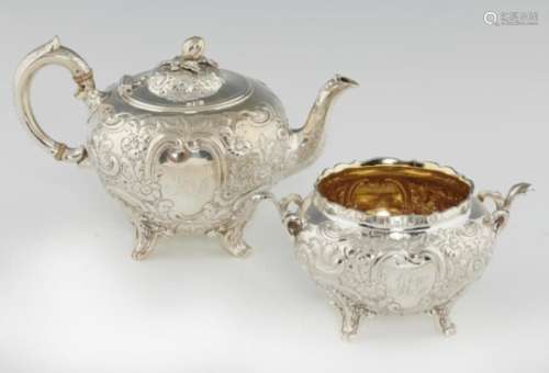 A VICTORIAN GLOBULAR SILVER TEAPOT AND SUGAR BOWL EN SUITE the domed lid with melon knop, teapot