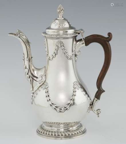 A GEORGE III GADROONED SILVER COFFEE POT chased with festoons and paterae, 28cm h, by Richard Morson