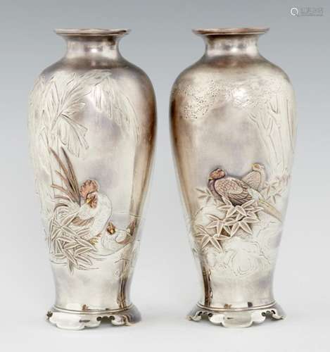 A PAIR OF JAPANESE SILVER AND MIXED METALS VASES, MEIJI PERIOD finely carved and applied with cock