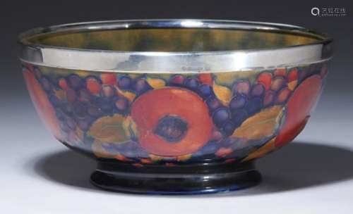 A MOORCROFT POMEGRANATE SALAD BOWL WITH EPNS RIM, C1920 20.5cm diam, impressed marks, green