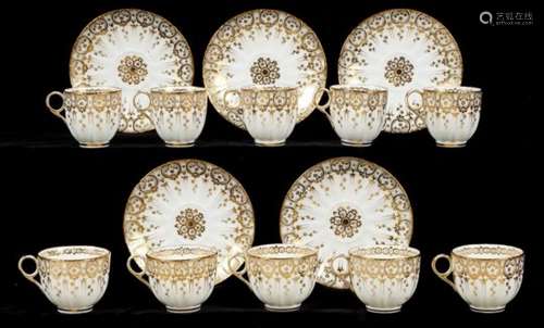 A SET OF FIVE COALPORT FLUTED WHITE AND GILT TRIOS, 1843-45 saucer 14cm diam, pattern 4/955++One