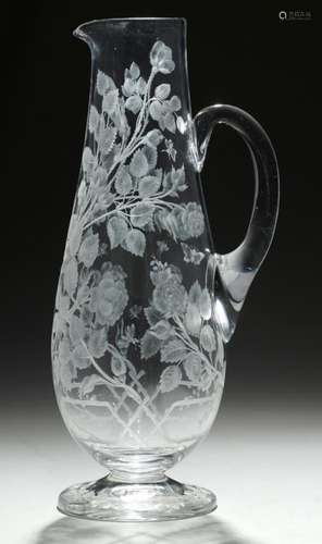 A VICTORIAN GLASS JUG, C1870 of slender baluster form, finely engraved with roses, briars and