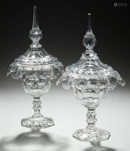 TWO CUT GLASS SWEETMEAT JARS AND COVERS, C1900 with turnover rim and spire finial, 33 and 34cm h++