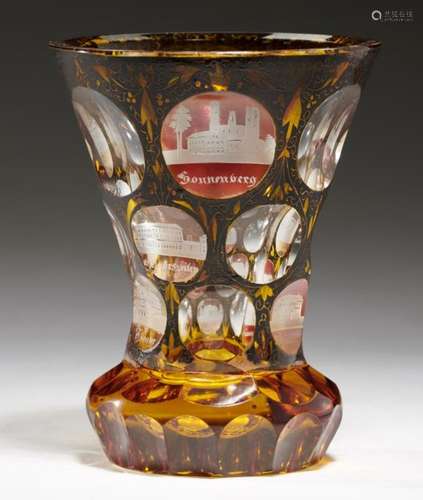 A BOHEMIAN AMBER FLASHED SPA GLASS, MID 19TH C engraved with nine named monuments, 12.5cm h++Fine