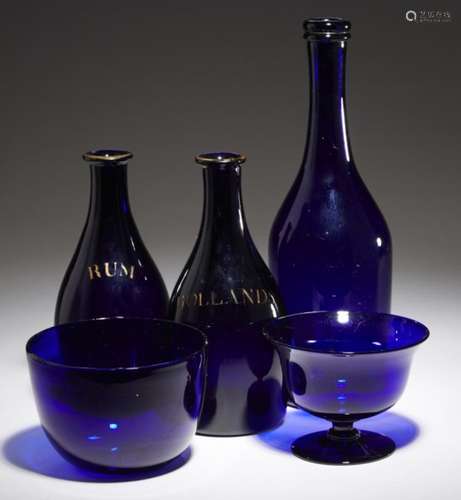 THREE BLUE GLASS DECANTERS, TWO INSCRIBED HOLLANDS OR RUM, 19TH /20THC 28.5cm h and smaller and