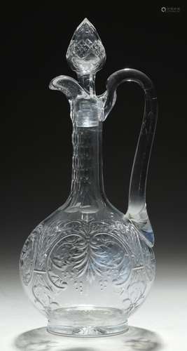 AN ENGLISH INTAGLIO ENGRAVED GLASS CLARET JUG, C1890 and an associated cut glass stopper, 30cm h