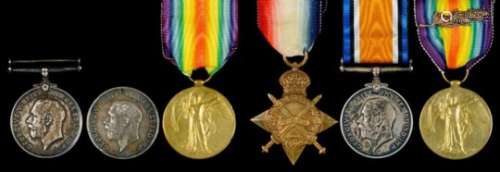 WORLD WAR ONE GROUP OF THREE 1914-15 Star, British War Medal and Victory Medal with Mention emblem