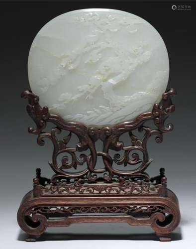 A CHINESE WHITE JADE PLAQUE, QING DYNASTY, 19TH C of slightly convex form carved with phoenix and