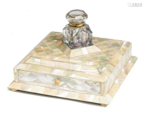 A VICTORIAN MOTHER OF PEARL INKSTAND, C1850 fitted with a drawer, brass mounted glass inkwell, on