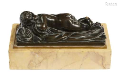 A MINIATURE FRENCH BRONZE SCULPTURE OF THE SLEEPING PUTTO, 19TH CENTURY rich brown patina, on sienna
