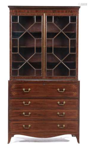 A GEORGE IV MAHOGANY AND LINE INLAID SECRETAIRE BOOKCASE, C1830 with dentil cornice and adjustable