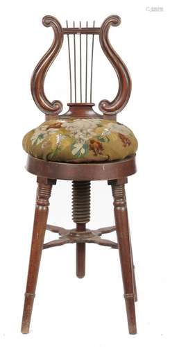 AN EARLY VICTORIAN MAHOGANY HARPIST'S CHAIR the lyre shaped back with brass rod strings, the