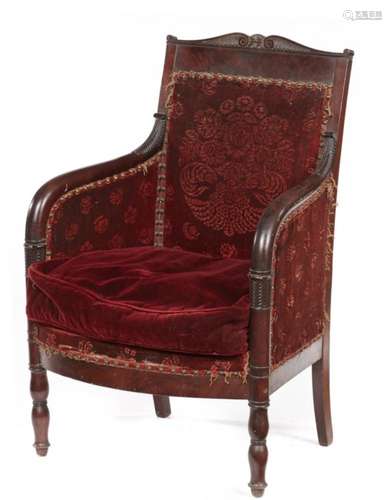 A CHARLES X MAHOGANY ARMCHAIR, C 1830 with carved acanthus decoration, on bulbous forelegs