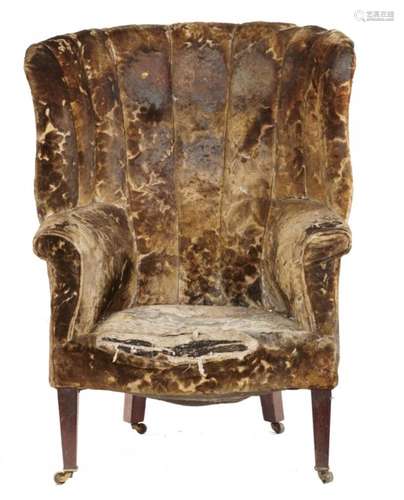 A GEORGE III MAHOGANY ARMCHAIR with curved back and outscrolled arms, on square tapering legs++