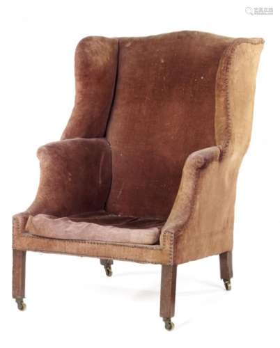 A GEORGE III MAHOGANY WING BACK ARMCHAIR, LATE 18TH C on chamfered square legs and brass castors ++