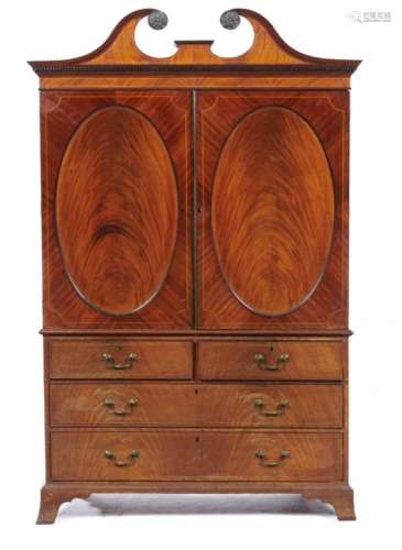 A MAHOGANY AND LINE INLAID LINEN PRESS, 19TH C with swan neck pediment and dentil cornice, now