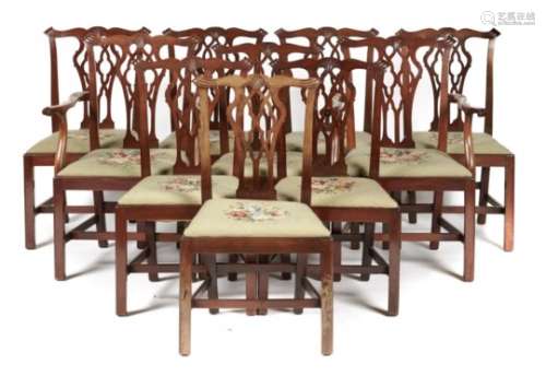 A SET OF TEN MAHOGANY DINING CHAIRS IN GEORGE III STYLE, EARLY 20TH C with leaf carved 'gothick'