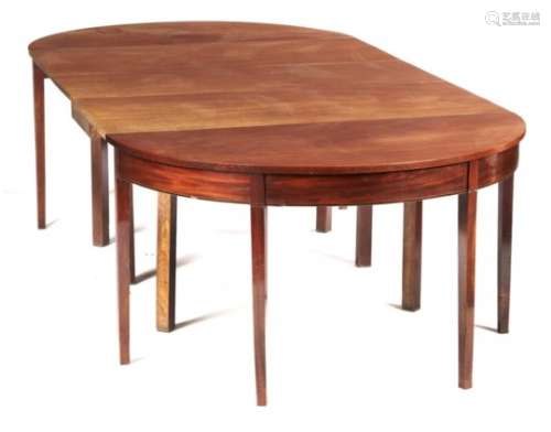 A GEORGE III MAHOGANY DINING TABLE, EARLY 19TH C with semi-circular ends and drop leaf centre