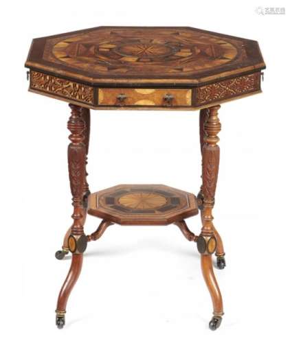 A VICTORIAN OCTAGONAL SPECIMEN WOOD, CARVED WALNUT AND EBONISED OCCASIONAL TABLE BY JOHN BURN HESLOP
