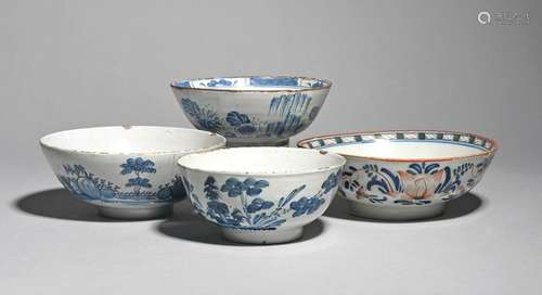 Four delftware slop bowls mid 18th century, the sm…