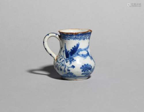 A delftware cream jug c.1760, the pear shaped form…