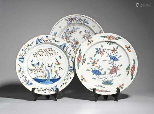 Three large tin glazed chargers 18th century, one …