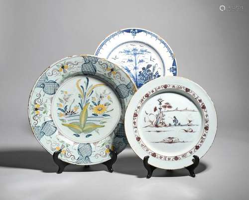 Two delftware chargers mid 18th century, one paint…