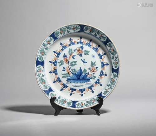 A Bristol delftware charger c.1730, painted in blu…