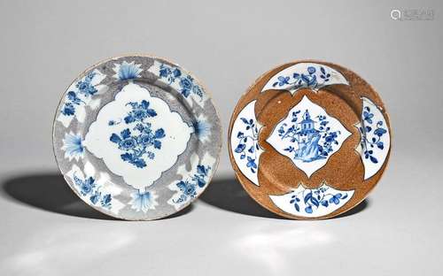 Two delftware powdered ground plates c.1740 50, on…