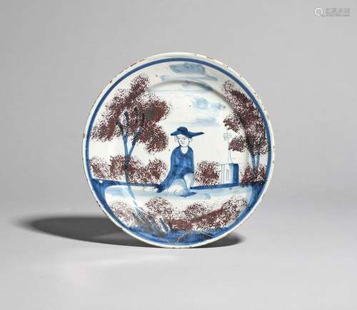 A delftware plate c.1730, probably Bristol, painte…