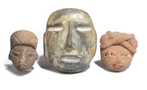 A Chontal style mask stone, 7.7cm high, and two Ec…
