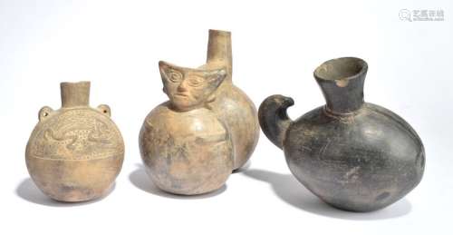 Three Peruvian vessels pottery, including a double…
