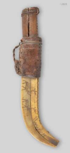 A Sami knife and sheath Lapland with a wood handle…